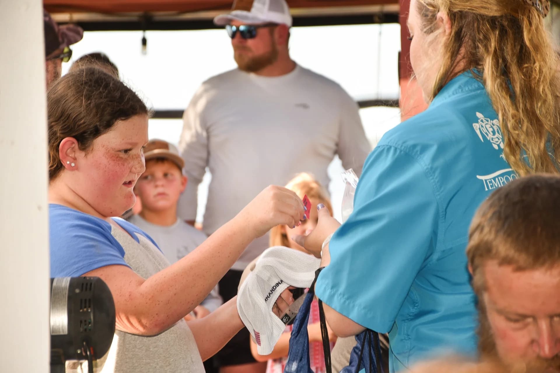 Young angler receiving a prize at the Kids Kingfish Derby awards